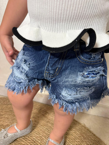 Pantaloni jeans strappi con piellettes
