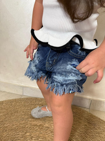 Pantaloni jeans strappi con piellettes